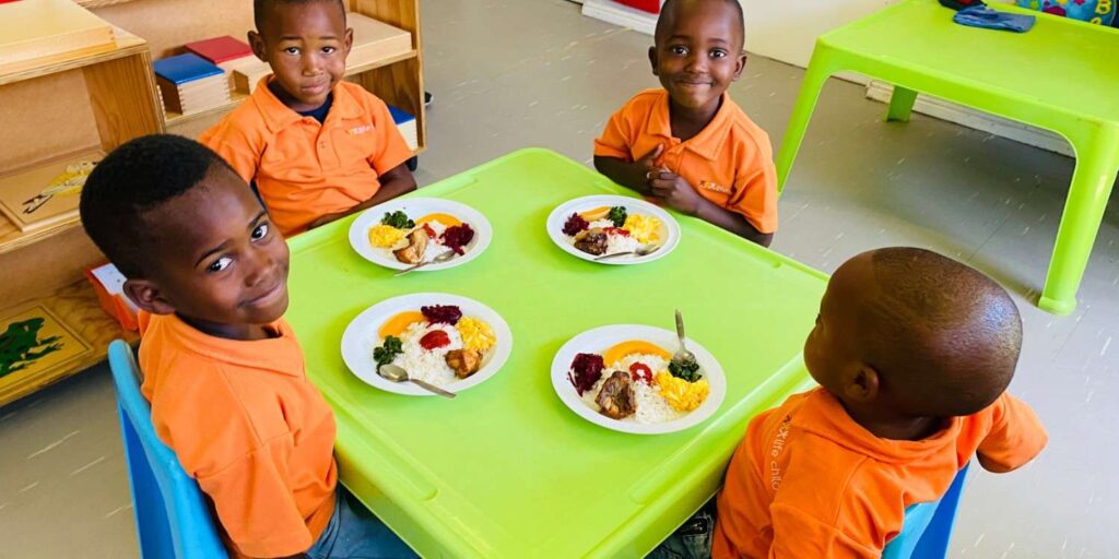 Children having a meal