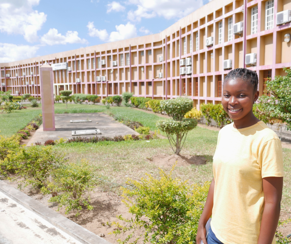 Esperanca in front of her university